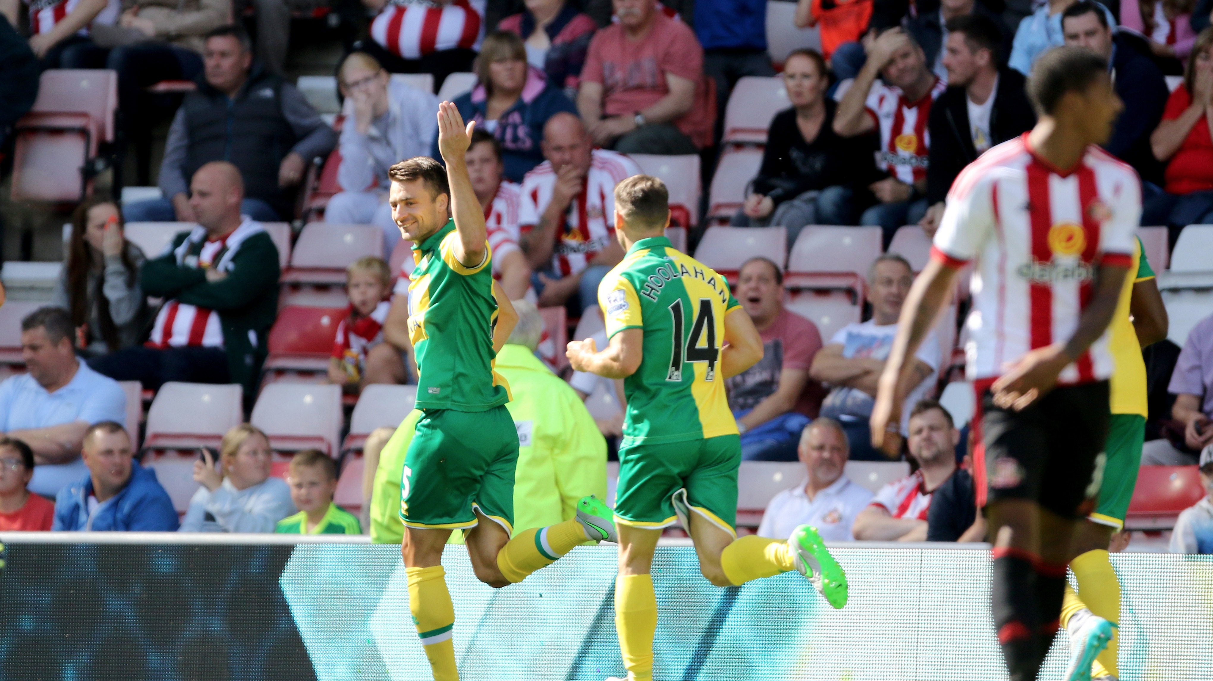 Russell Martin celebrates his opening goal with Norwich team-mates, Photos