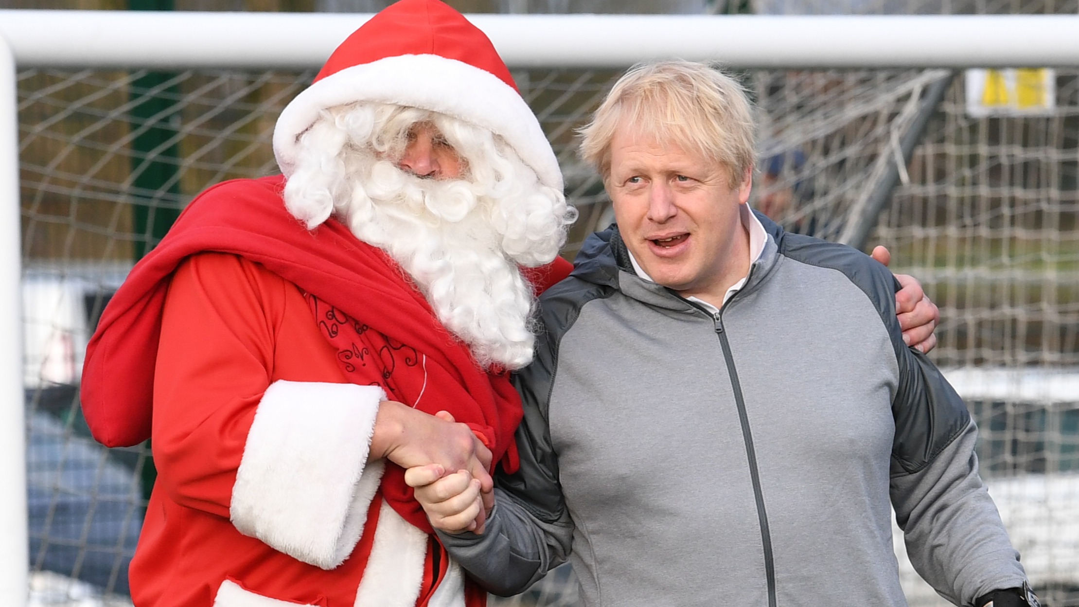 Covid Boris Johnson tells concerned 8yearold Santa Claus will be