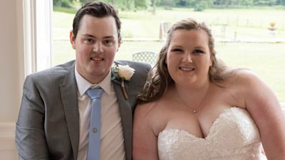 02-07-21 Miles with his partner during the ceremony- BPM Media/Devon Live