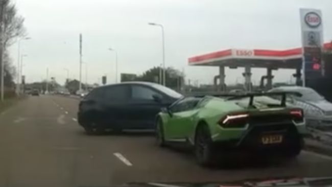 Still from dashcam footage of a Lamborghini crashing into another car in Peterborough.  Footage originally issued with PR from Cambridgeshire Police. 
CREDIT: Cambridgeshire Police