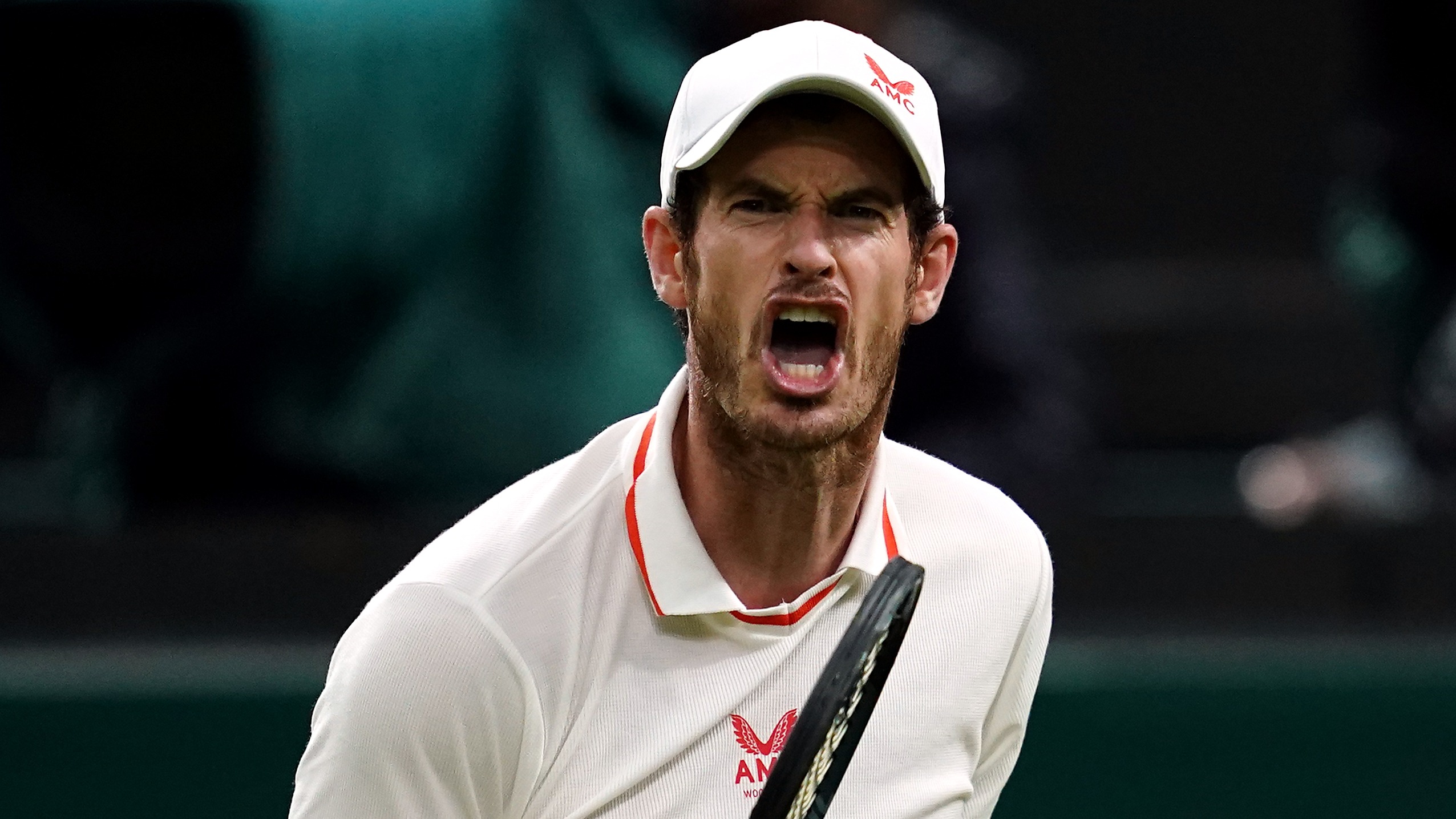 Andy Murray wins first Wimbledon match after four years away from