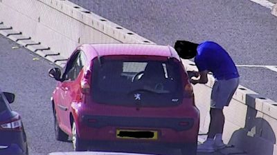 Motorist seen checking his mirrors on the m6