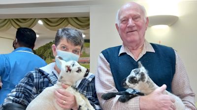 Carole Taylor and Fred Grant with lambs Tulip and Oreo