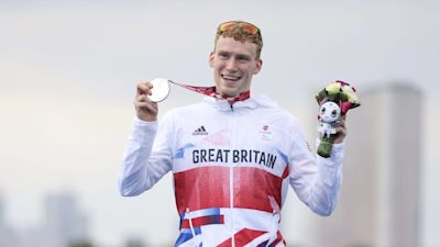 George Peasgood with his silver medal in the PTS5 men's triathlon at Tokyo 2020 Paralympics.
Credit: ParalympicsGB/PA
