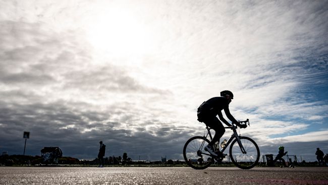 18102021 - Man on a bike - PA Images