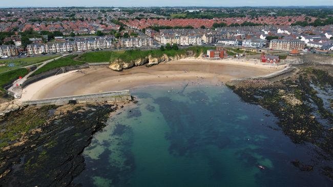 People out in the sunshine at cullercoats bay on North Tyneside, on what is forecast to be the hottest day of the year so far. Picture date: Thursday June 16, 2022.