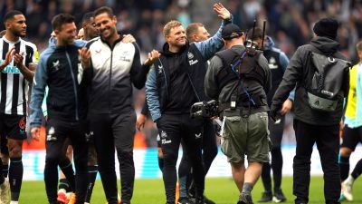 Newcastle United manager Eddie Howe (centre) waves to fans following the Premier League match at St. James' Park, Newcastle upon Tyne. Picture date: Sunday April 23, 2023.