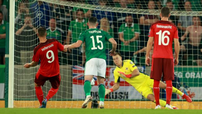 Switzerland's Haris Seferovic penalty is saved by Northern Ireland's Bailey Peacock-Farrell during the 2022 FIFA World Cup Qualifying match at Windsor Park, Belfast. 
Picture date: Wednesday September 8, 2021.
Picture by: Niall Carson / PA Images