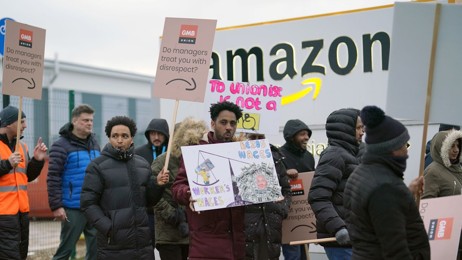 Hundreds of Amazon workers walking out amid pay dispute | ITV News