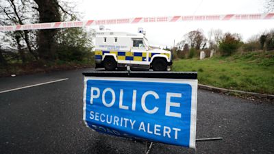 Police at the scene of a bomb alert that turned out to be a viable fireball-type device planted near a female police officer's car in Dungiven, Co Londonderry.
