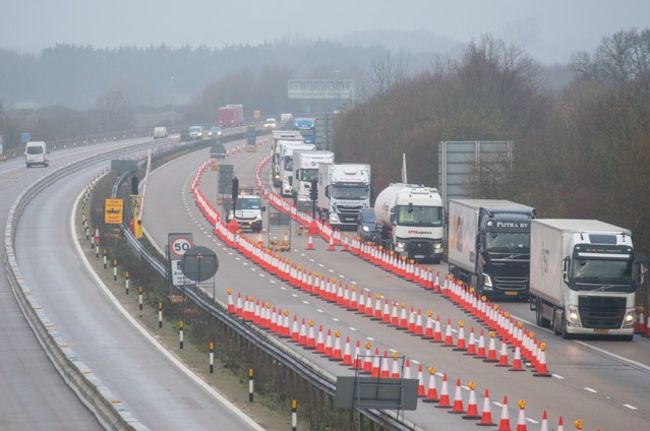 Freight lorries separated from other traffic on a Dover-bound section of the M20 motorway in Kent 