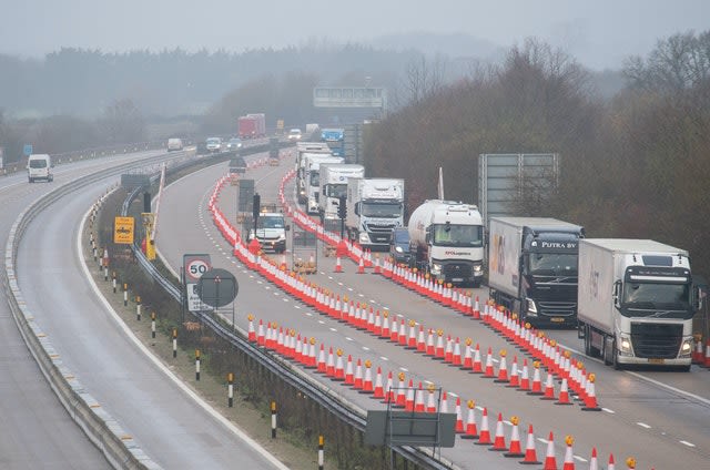 Freight lorries separated from other traffic on a Dover-bound section of the M20 motorway in Kent 