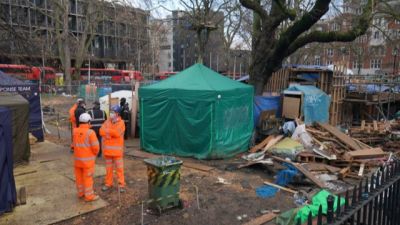 Enforcement officers continue efforts to remove protestors from underground tunnels at the HS2 Rebellion encampment in Euston Square Gardens in central London. Picture date: Friday February 5, 2021.