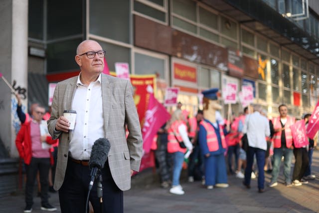 CWU general secretary Dave Ward with postal workers on the picket line during an earlier strike.