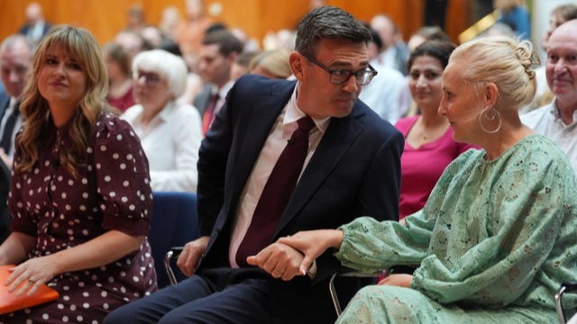 Andy Burnham speaking with his wife Marie-France van Heel ahead of being confirmed as the new leader of the Labour Party at a special conference held at the Trades Union Congress, in central London, on July 17