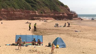 05-05-21 People on Exmouth Beach- ITV News