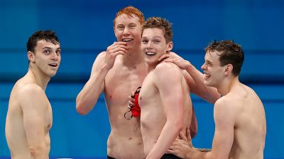 James Guy, Tom Dean, Matt Richards and Duncan Scott after winning the 4x200m relay at the Tokyo Olympics. Credit: PA