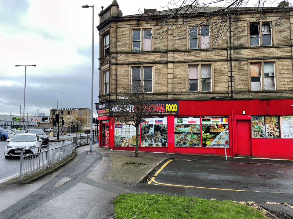 Man charged with murder after mother stabbed to death in Bradford street