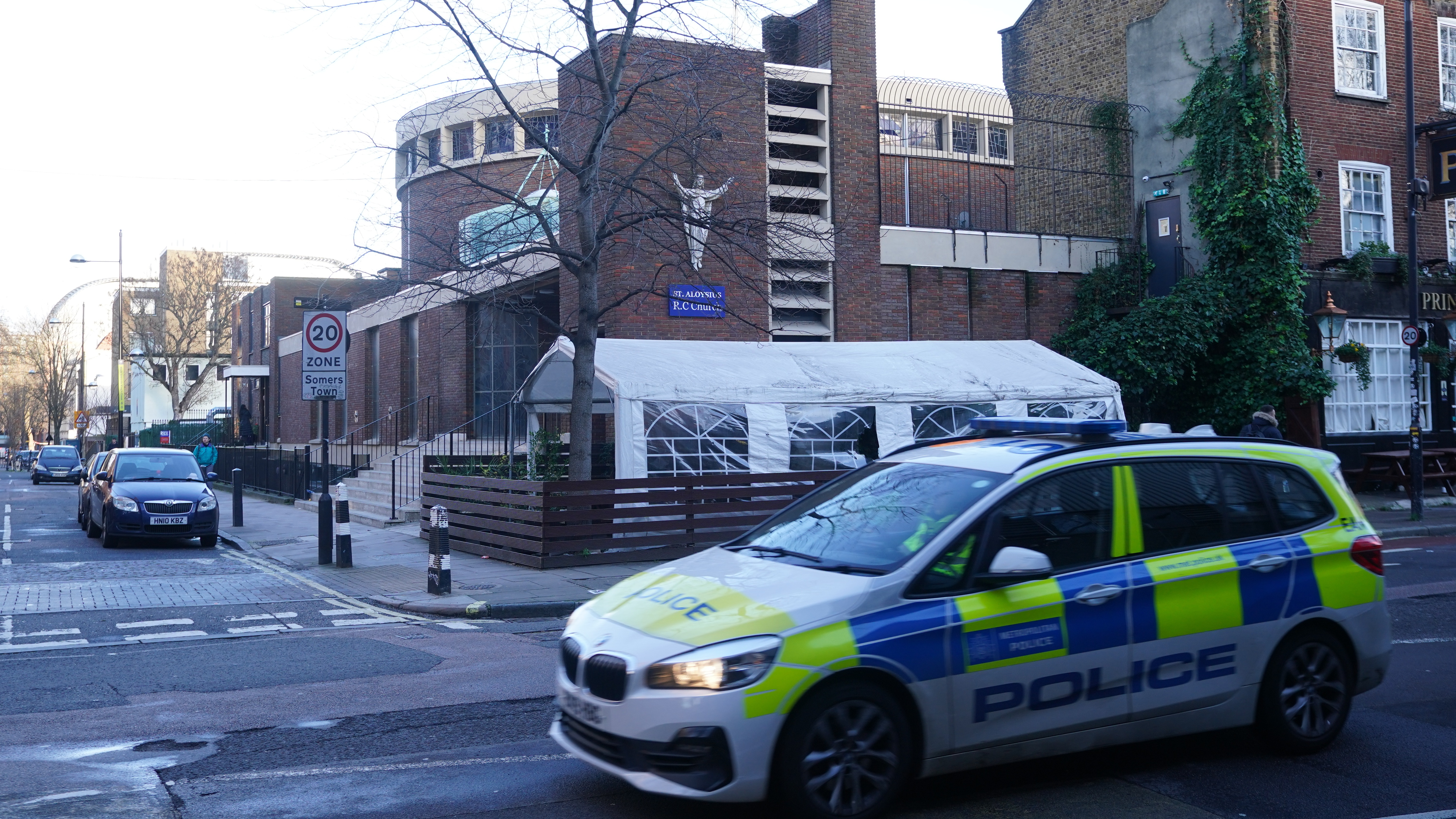 Teenager charged and two men arrested over driveby shooting at funeral