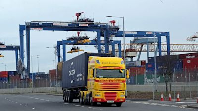 PA Images. Compressed for web.
Northern Ireland Belfast Larne Cranes Lorries Lorry Harbour Port Trade