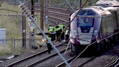 One dead and dozens seriously injured as two trains collide near Bedford