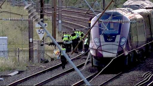 One dead and dozens seriously injured as two trains collide near Bedford