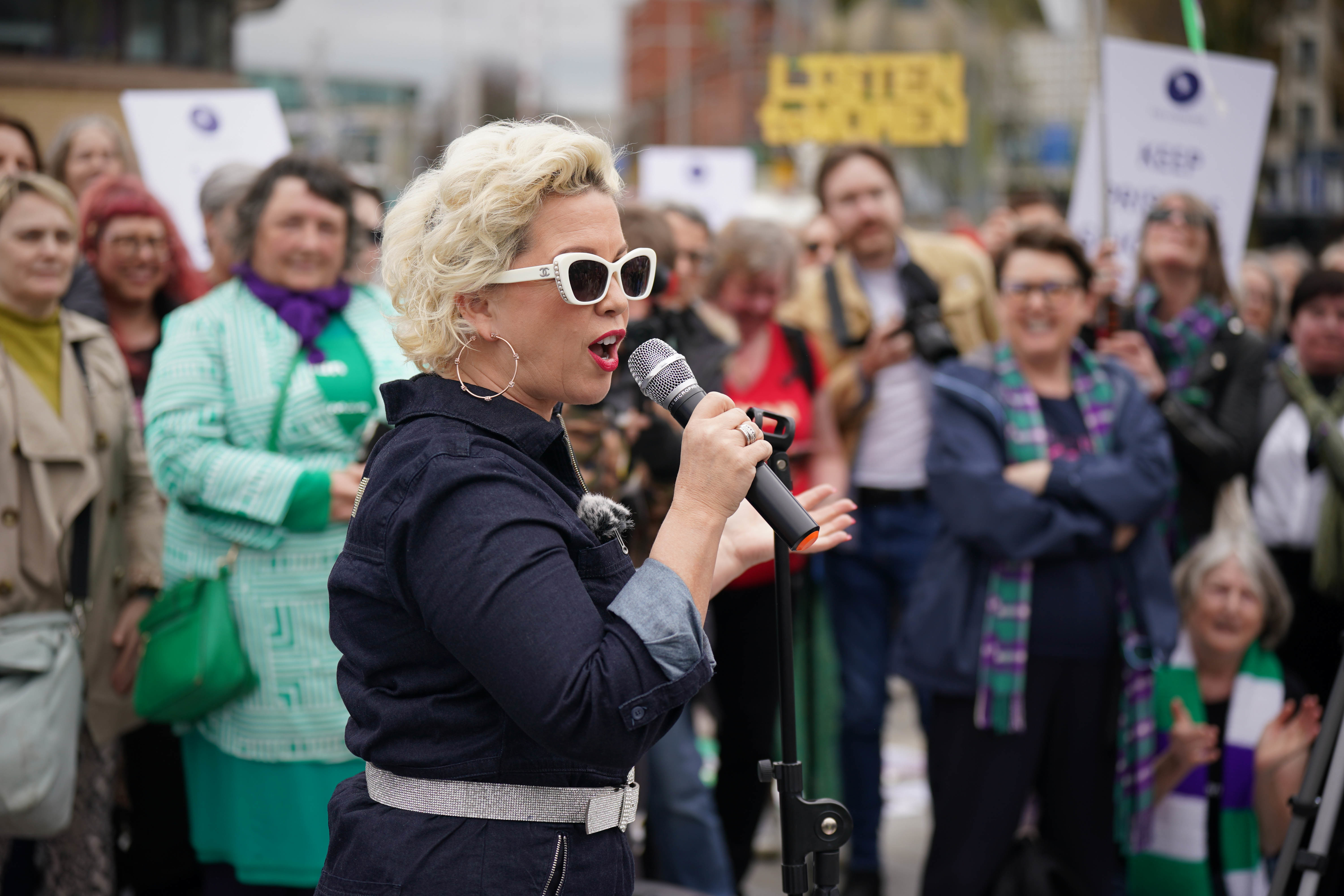 Police form line between rival transgender debate demostrations in ...