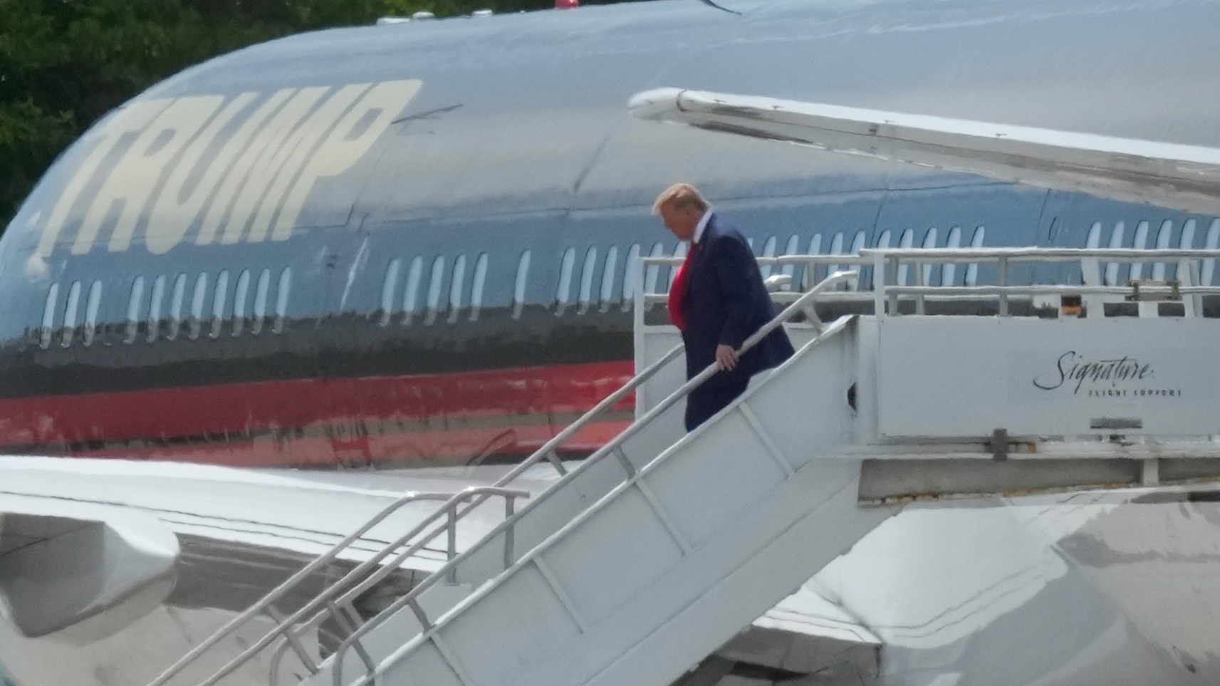 Donald Trump Lands In Miami Ahead Of Historic Court Appearance | ITV News