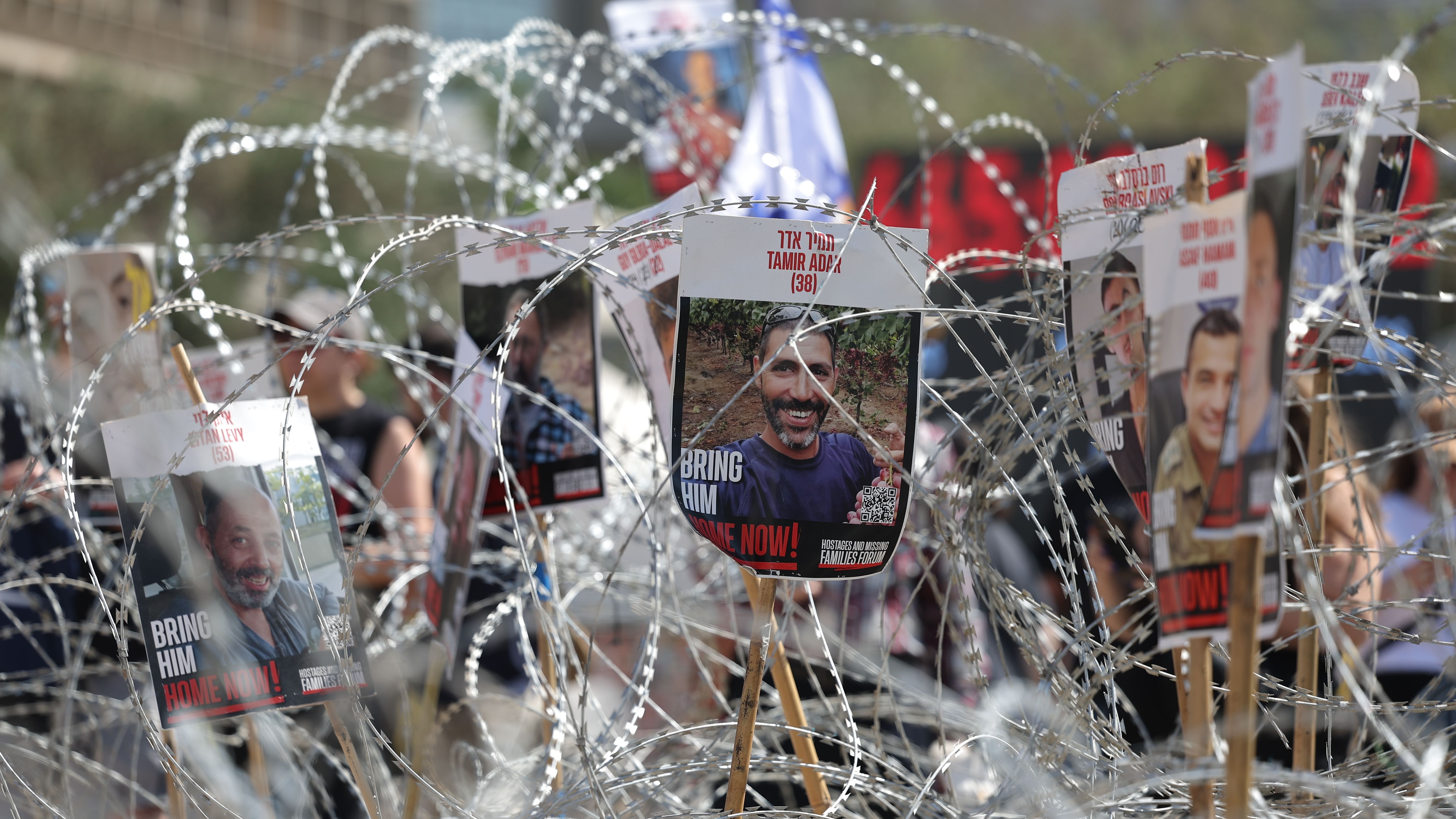 Tens of thousands of Israelis rally after Gaza militants release videos showing emaciated captives