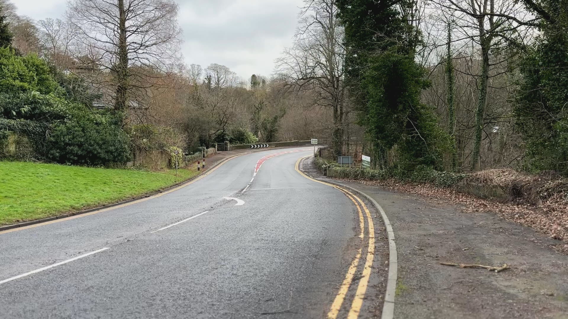 Man in hospital after two cars crash into fallen tree in