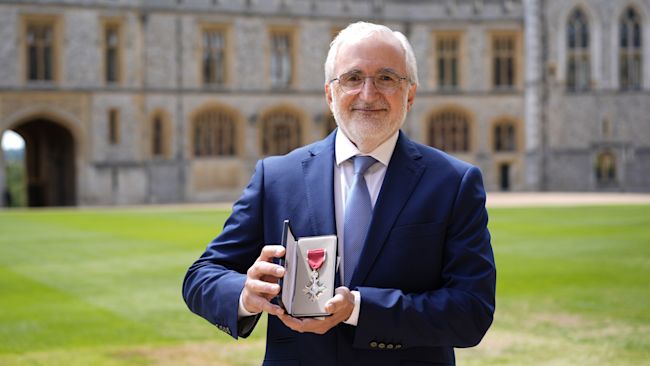 Dr. Nasser Kurdy, from Altrincham, after being made a Member of the Order of the British Empire (MBE) during an investiture ceremony at Windsor Castle