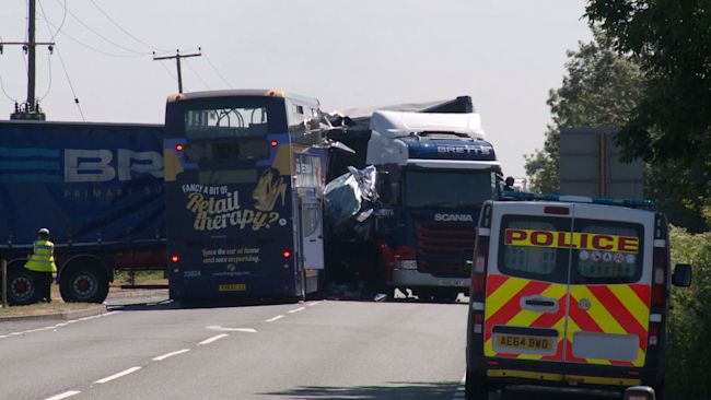 The uninjured lorry driver tried to help pull passengers from the damaged bus.