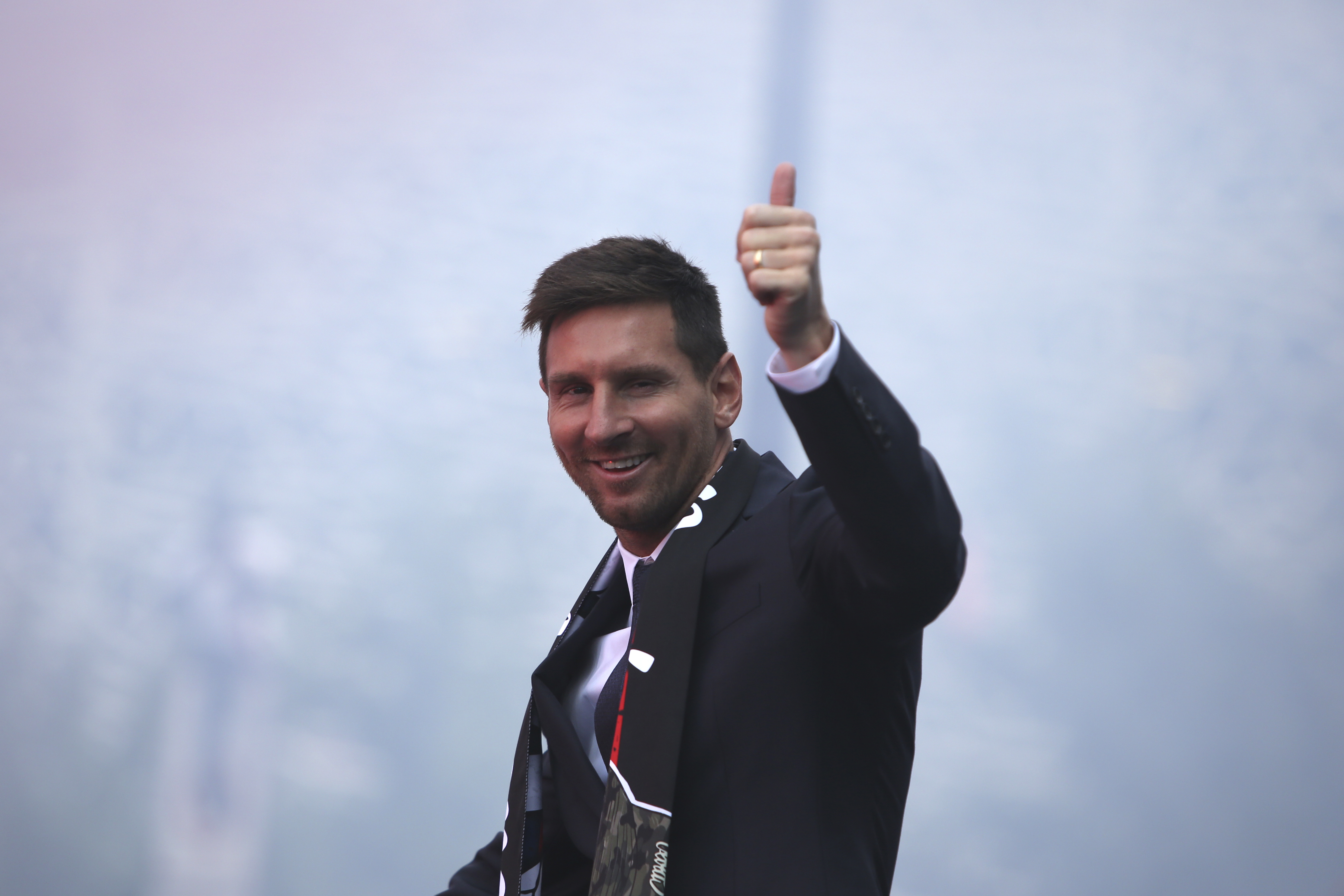 Lionel Messi poses in new PSG kit as he silences any rumours of