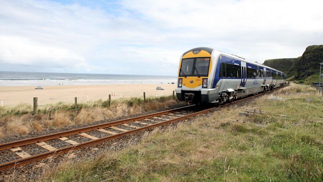 The Londonderry to Coleraine train passing Downhill, in Co Londonderry today. One of Ireland's most scenic railway routes has fallen victim to government cutbacks as a long planned track upgrade hit the buffers.
Picture by: Paul Faith/PA Archive/PA Images