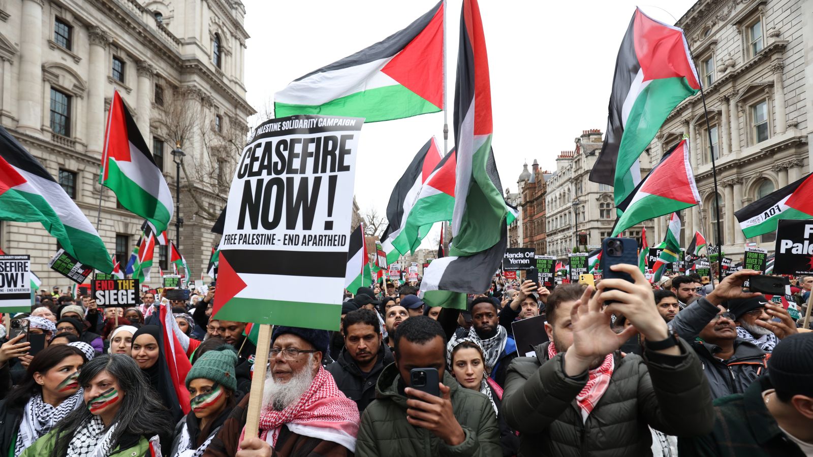 Over 10,000 pro-Palestine supporters march through London calling for ...