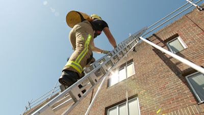 Man climbing ladder
