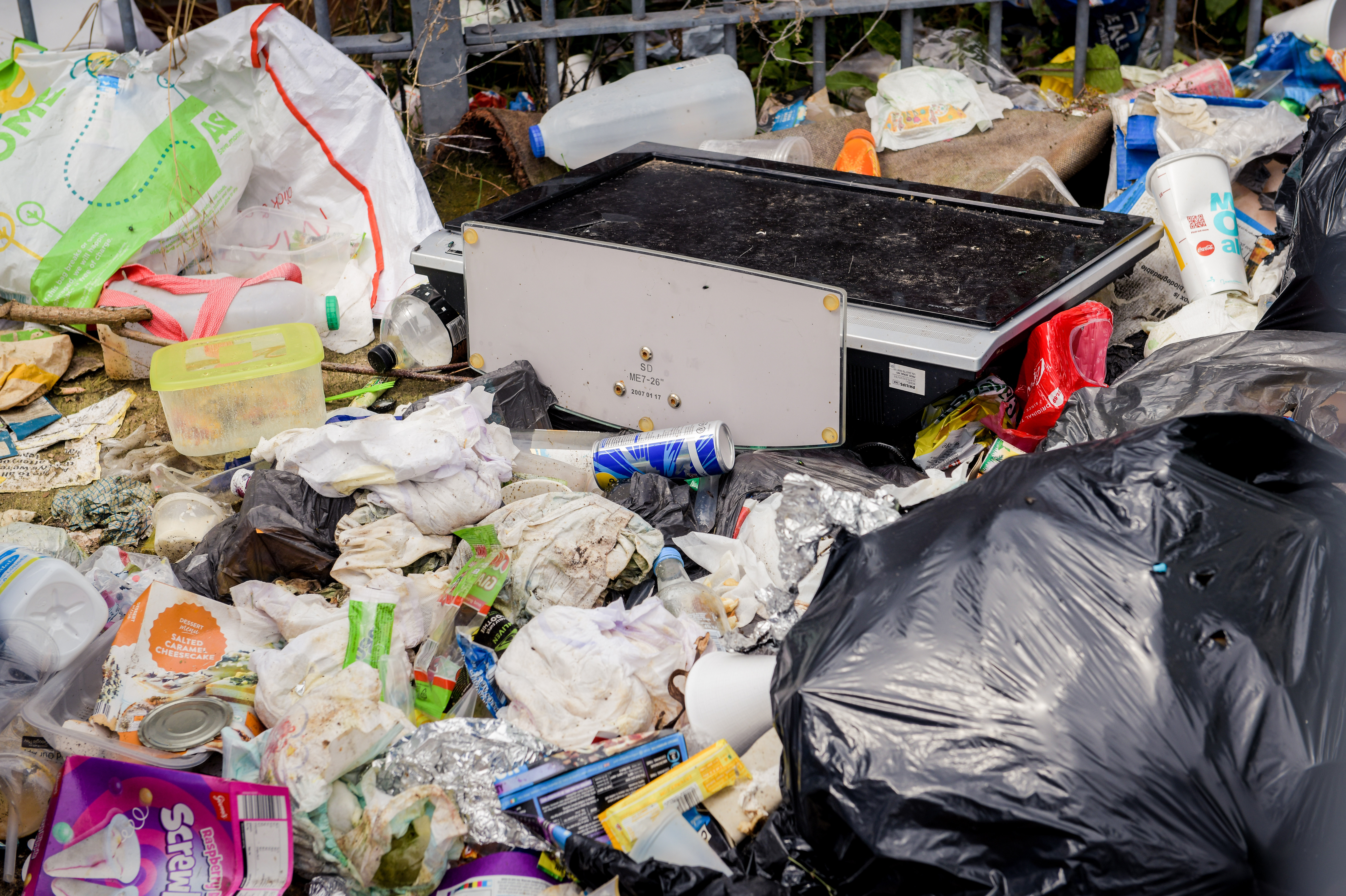 Residents fill neighbours' bins at 3am and now they're so disgusting