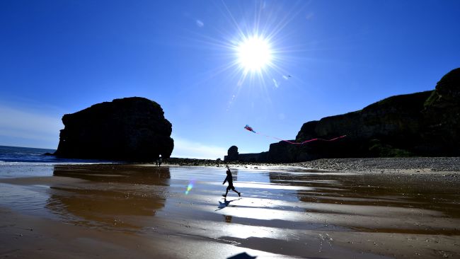 A child pays on Marsden Beach in South Shields
