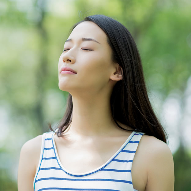 Woman-relaxing-eyes-closed