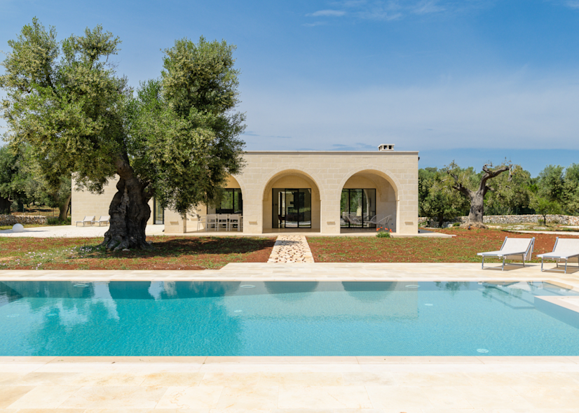 The exterior of a villa in Puglia with a private garden and pool