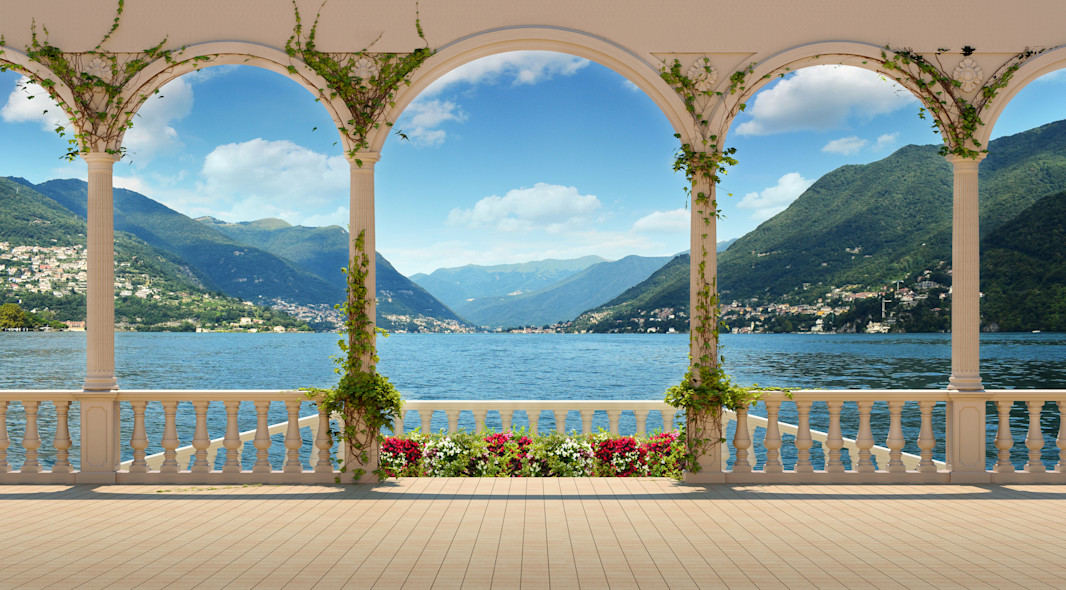 The lakefront view of a historic villa on Lake Como.