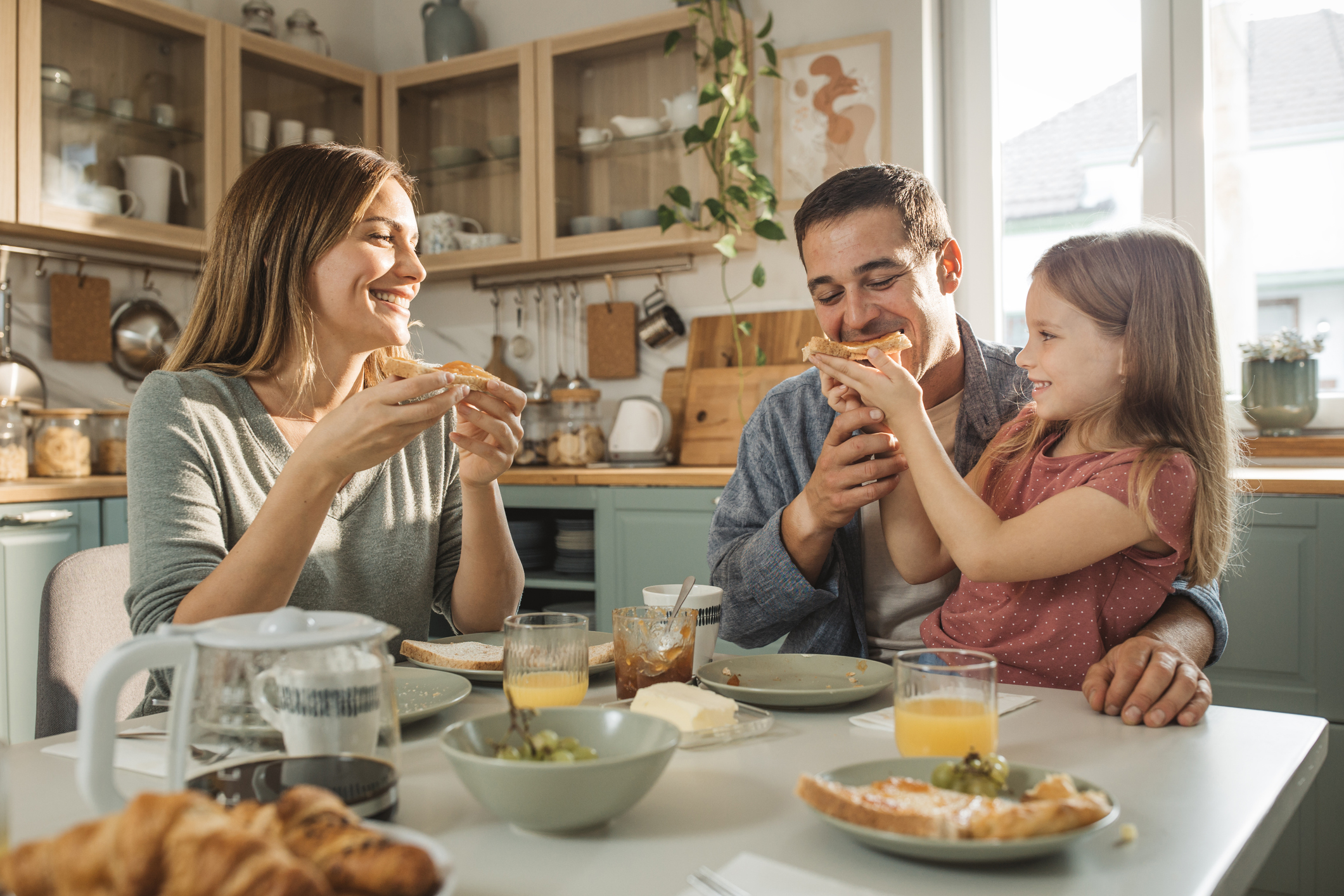 A family having breakfast in the kitchen