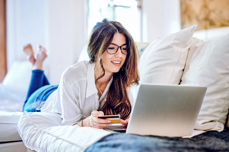 Woman paying online with her credit card