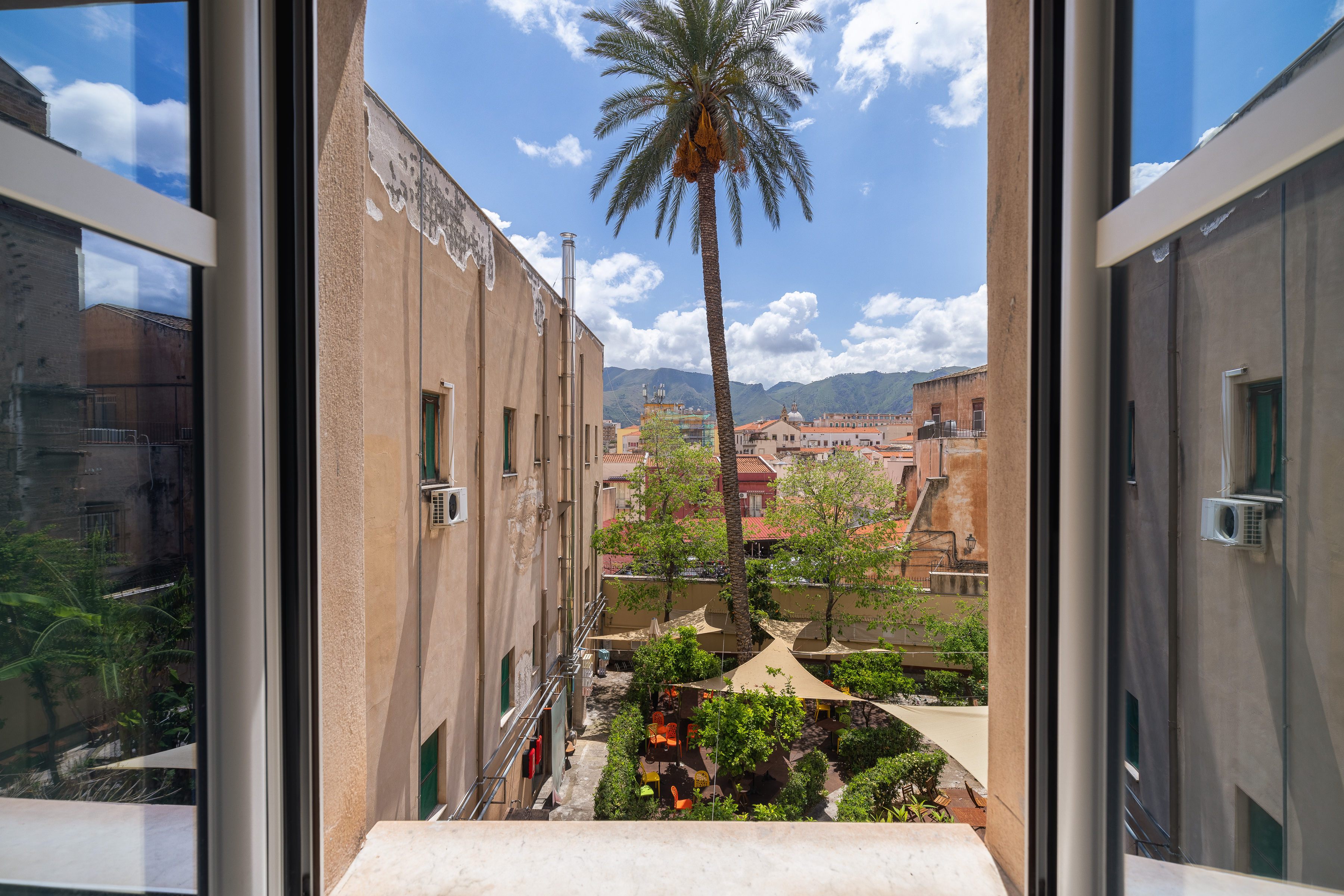 View of downtown Palermo from a room in Casa San Francesco, a facility engaged in social impact projects