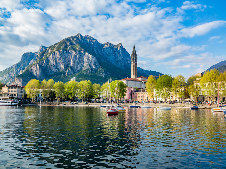 The city of Lecco and the Bell Tower of San Nicolò as seen from the lake