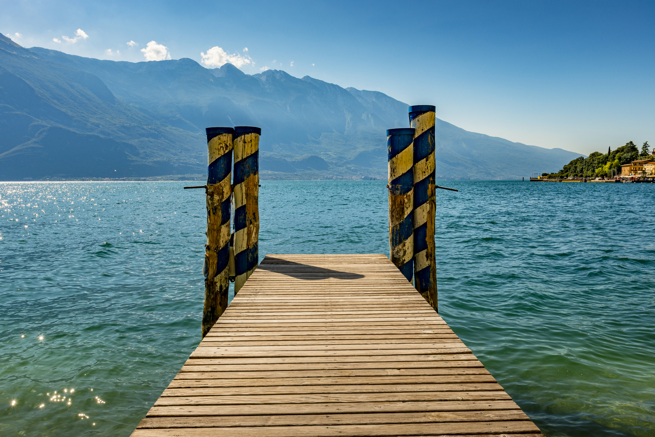 Dock on Lake Garda with views of the surrounding mountains