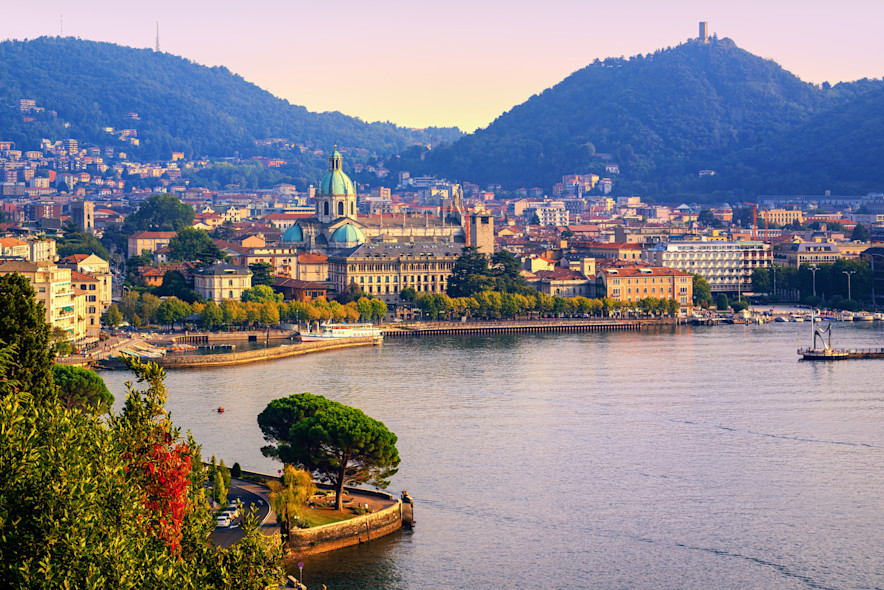 Como town at sunset as seen from the lake