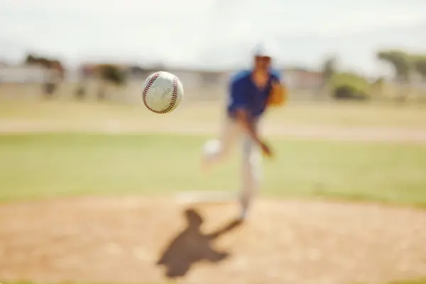 pitcher throwing ball