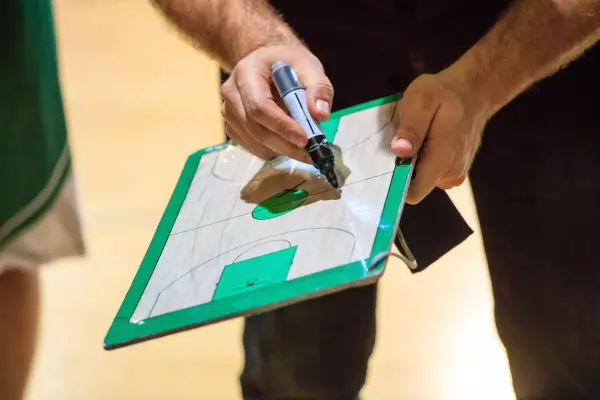 basketball-coach-with-clipboard