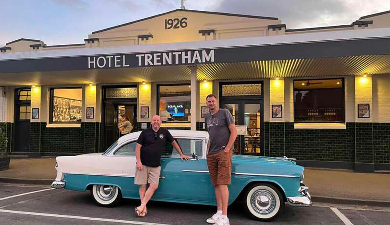 The owners and their classic car out the front of Hotel Trentham in the heart of Trentham. 
